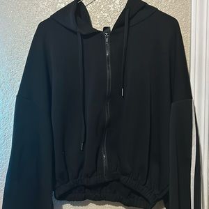 Black jacket with white lines.